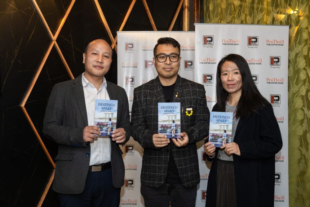 Author of 'Destined Apart', Wedekhro Naro with Assistant Professor and Controller of Examination, Kohima Science College, Jotsoma, Teisovi Gerard Meyase and PenThrill publisher Vishü Rita Krocha in Kohima on February 3.